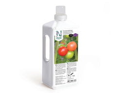 Flytende tomatnæring i kanne brukt for sterk vekst og rik avling