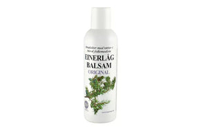 Flaske med Einerlåg balsam som gir volum, glans og styrke.