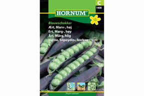 Høy margert med lilla blomster og mørke belger på planten