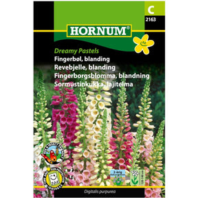 Fingerbøl i myke pastellfarger i blomsterbed