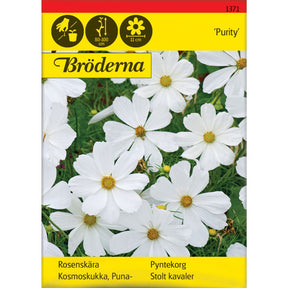 Pyntekorg Purity med hvite blomster i blomsterbed